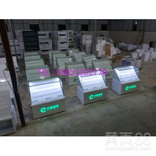 【河南許昌商場(chǎng)專賣店小賣部定做煙柜收銀臺(tái)一體化圖片】-